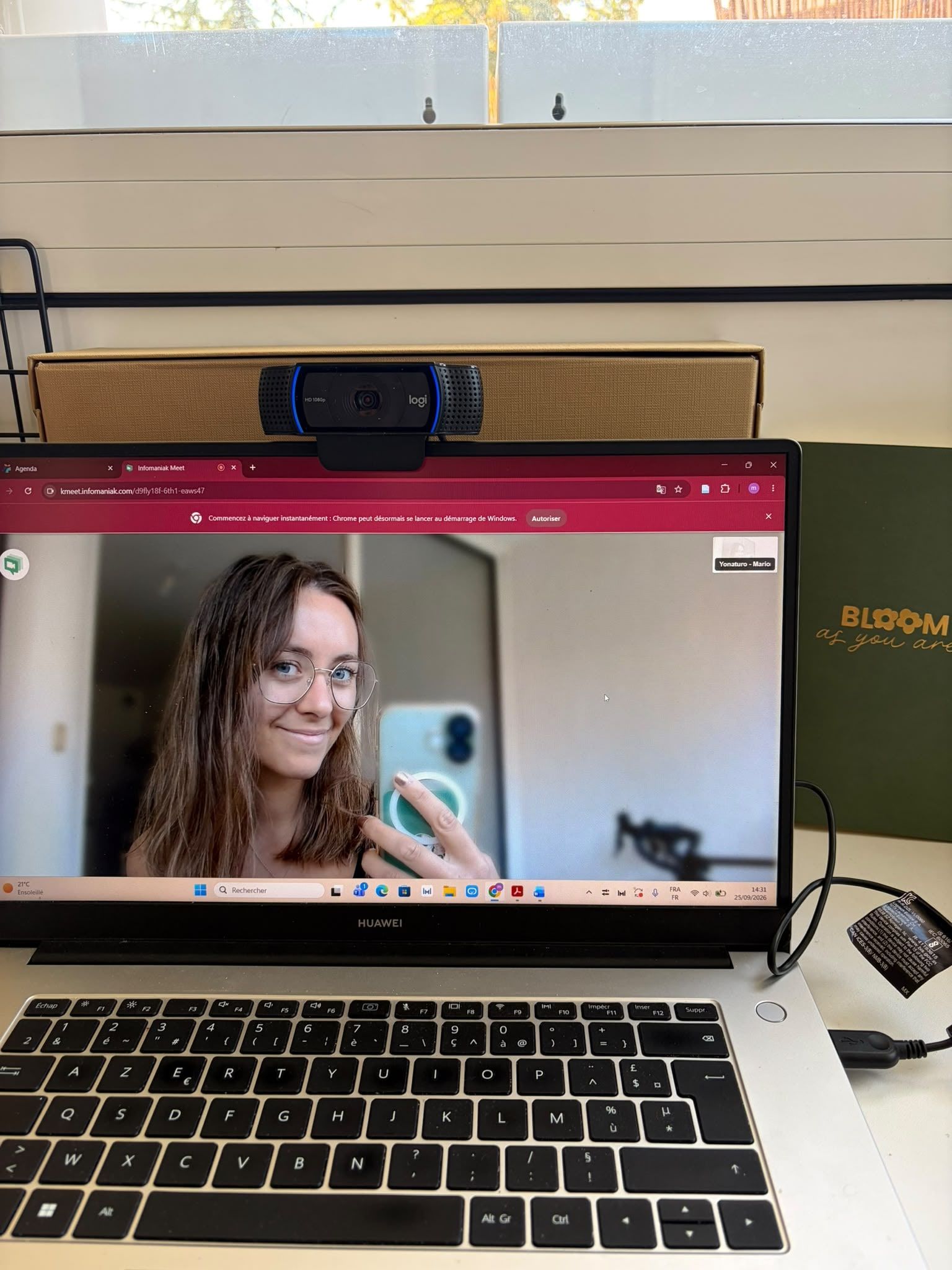 Marion Colin en visio, sur l'écran d'un ordinateur portable
